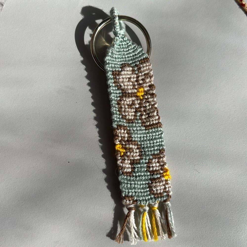 Handmade woven blue floral keychain